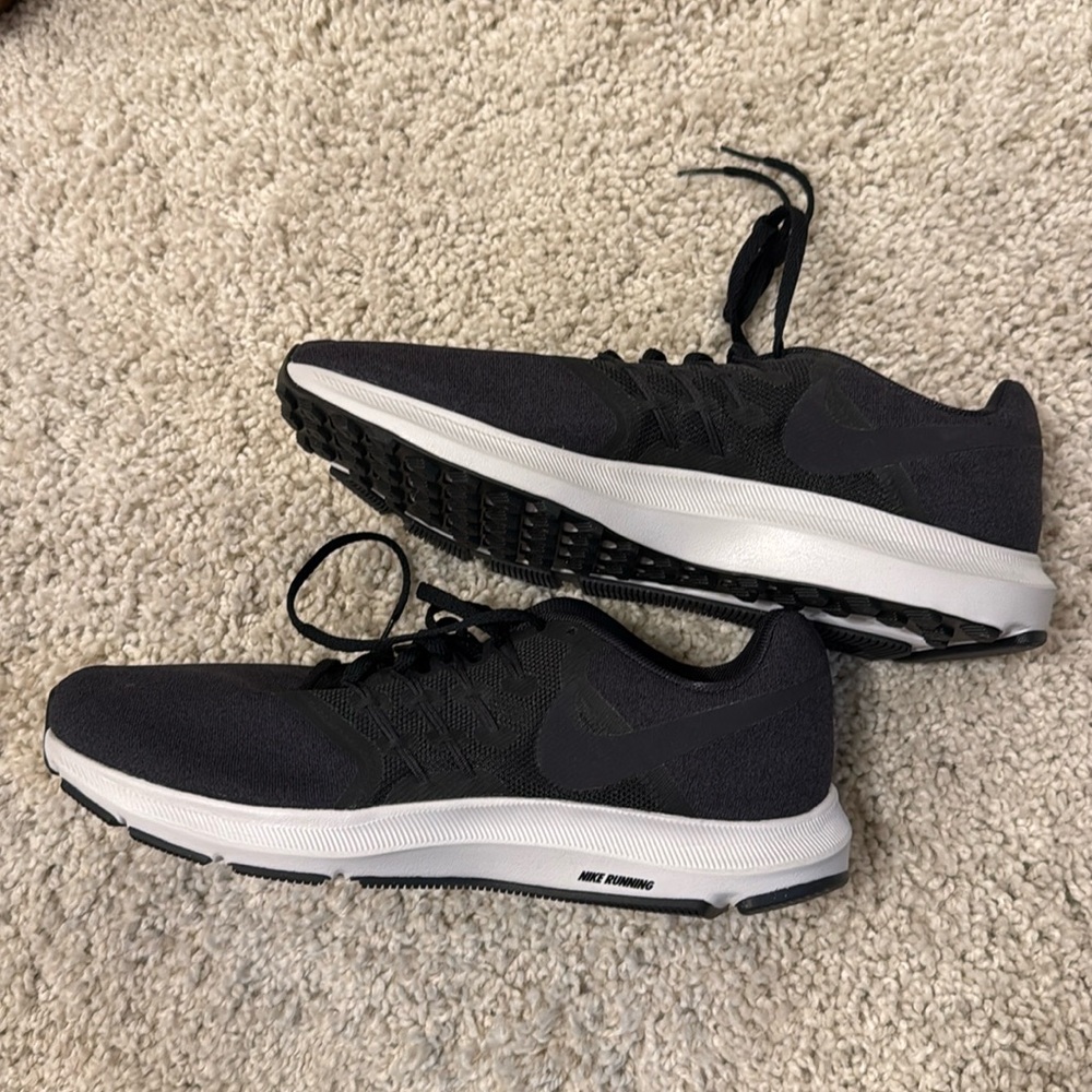 Nike run swift athletic shoes. Black. Never worn.